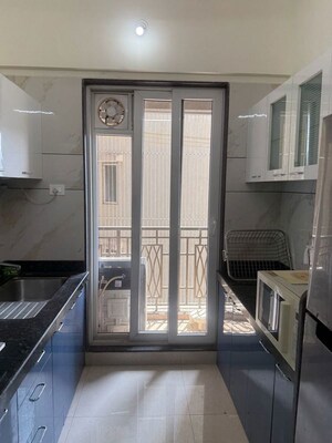 Kitchen in 3 BHK Apartment at Paradise Sai World Empire, Kharghar – for Rent