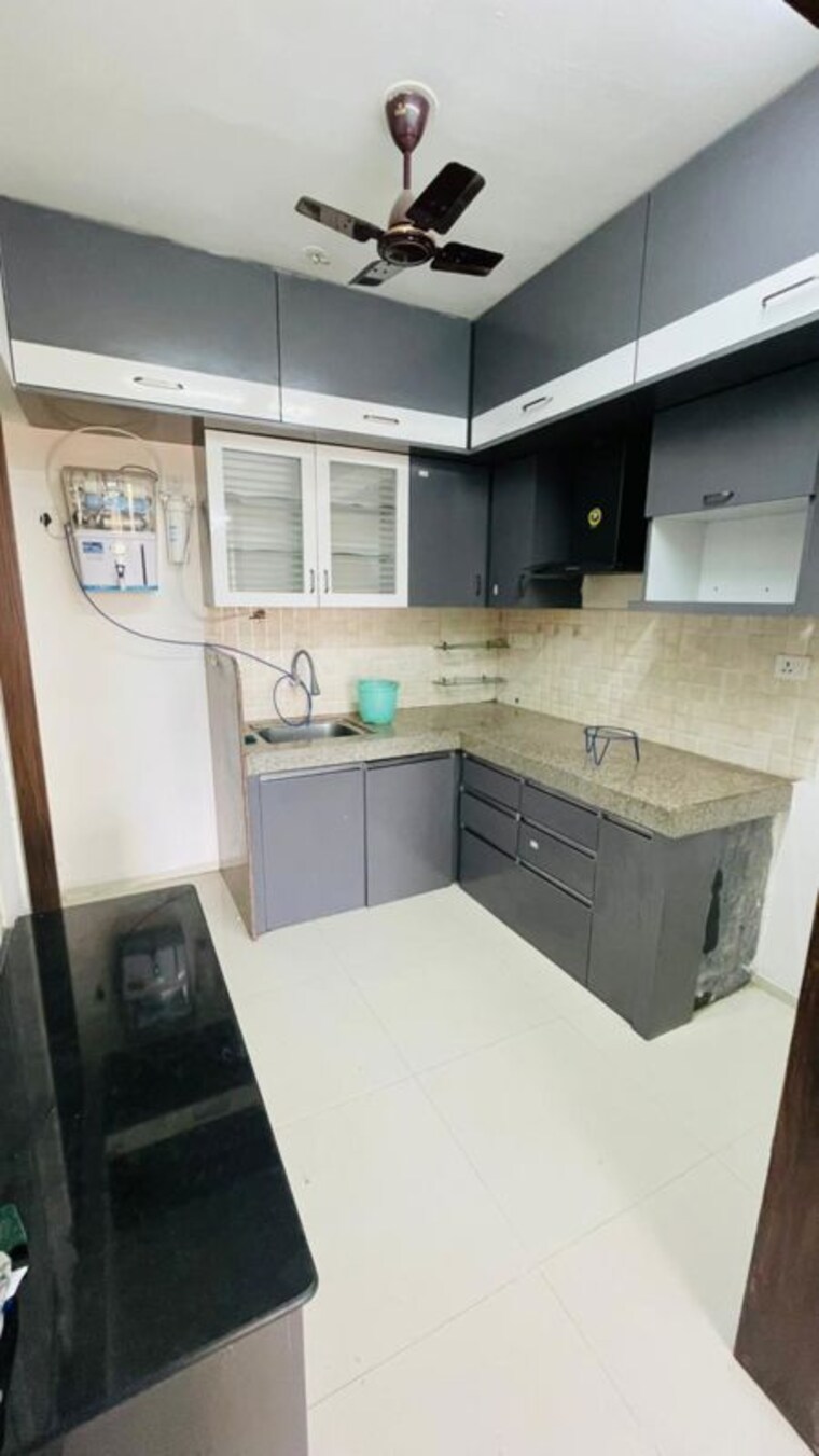Kitchen, saarrthi-stanza 1 Bedroom 900 Sq.Ft. Apartment In Punawale Pune 10441593