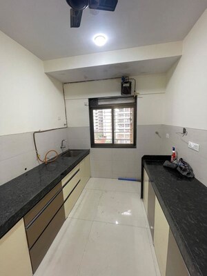 Kitchen in 3 BHK Apartment at Acme Ozone, Manpada – for Rent