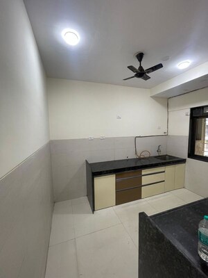 Kitchen in 3 BHK Apartment at Acme Ozone, Manpada – for Rent
