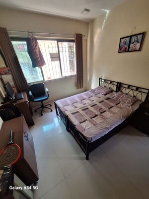 Bedroom in 2 BHK Apartment at Azad Nagar Sangam CHS Andheri, Andheri West – for Rent