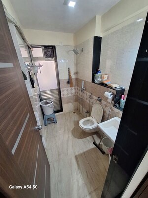 Bathroom in 2 BHK Apartment at Azad Nagar Sangam CHS Andheri, Andheri West – for Rent