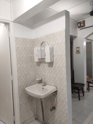Bathroom in 2 BHK Apartment at Roseland Residency – for Rent