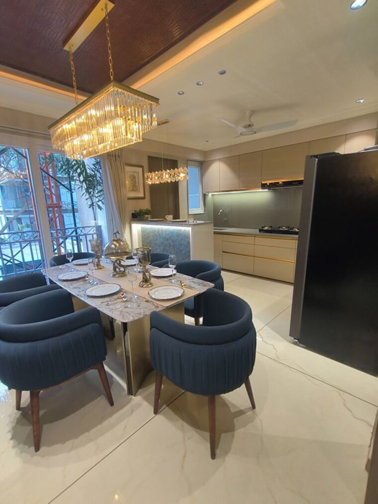 Dining area, courtyard-bellagio 4 Bedroom 2220 Sq.Ft. Apartment In Bhayli Vadodara 10441962