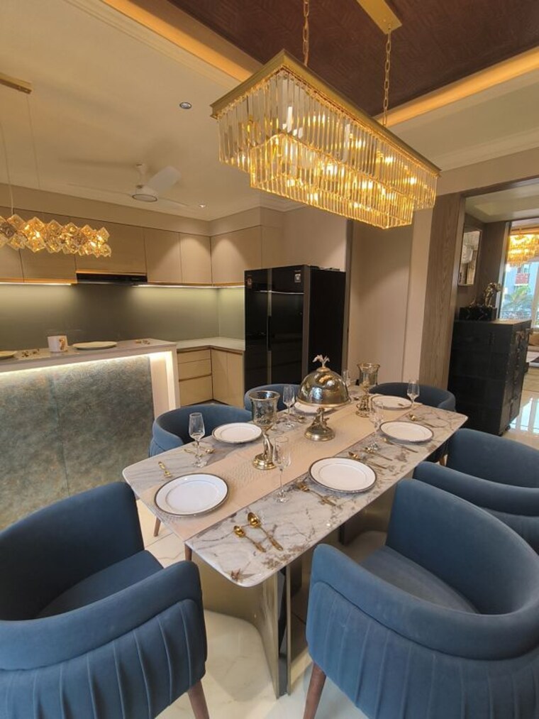 Dining area, courtyard-bellagio 4 Bedroom 2220 Sq.Ft. Apartment In Bhayli Vadodara 10441962