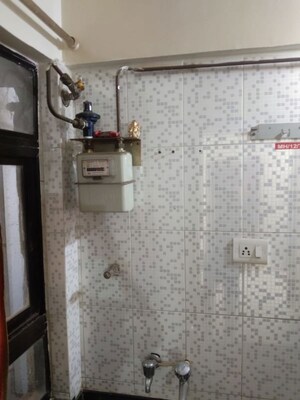 Kitchen in 2 BHK Apartment at Popular Colony Apartment, Warje – for Sale