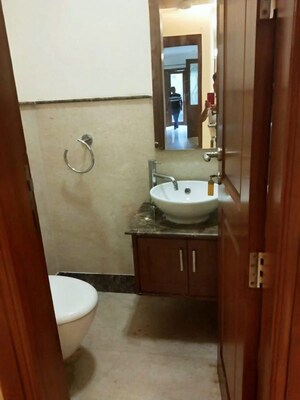 Bathroom in 4 BHK Apartment at Vasant Vihar – for Rent