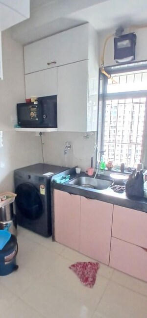 Kitchen in 2 BHK Apartment at Runwal Eirene, Balkum Pada – for Rent