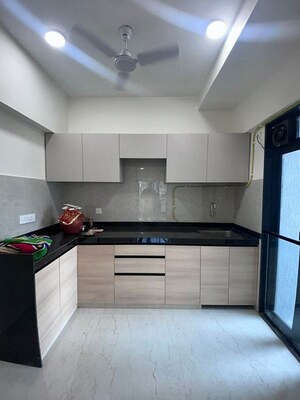 Kitchen in 2 BHK Apartment at Our Home CHS, Andheri West – for Rent