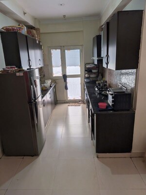 Kitchen in 3 BHK Apartment at Aims Golf City, Sector 75 – for Rent