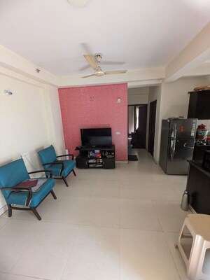 Living Room in 3 BHK Apartment at Aims Golf City, Sector 75 – for Rent
