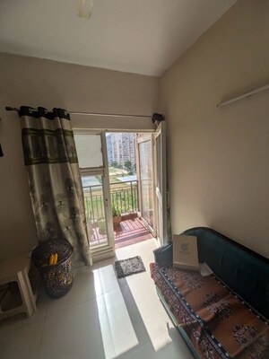 Living Room in 3 BHK Apartment at Aims Golf City, Sector 75 – for Rent