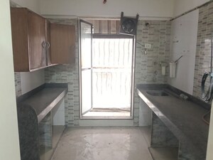 Kitchen in 3 BHK Apartment at Gaurav Woods, Mira Road – for Sale