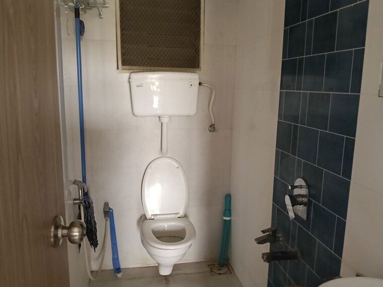 Bathroom, strawberry-onyx 2 Bedroom 720 Sq.Ft. Apartment In Mira Road Thane 10442464