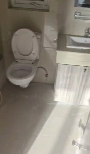 Bathroom in 2 BHK Apartment at Emaar MGF The Palm Drive Studios, Sector 66 – for Rent