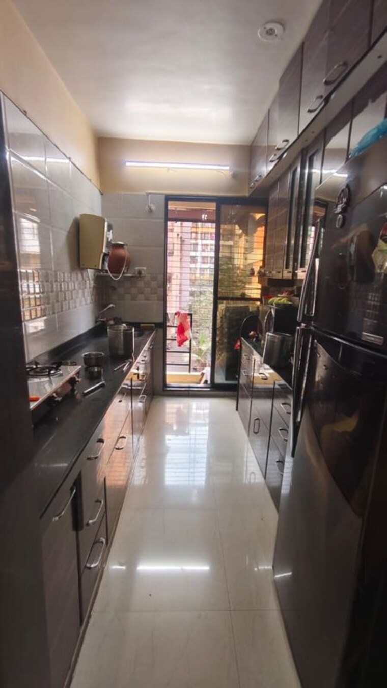 Kitchen, abhishek-chs-thakurli 2 Bedroom 650 Sq.Ft. Apartment In Thakurli Thane 10442722