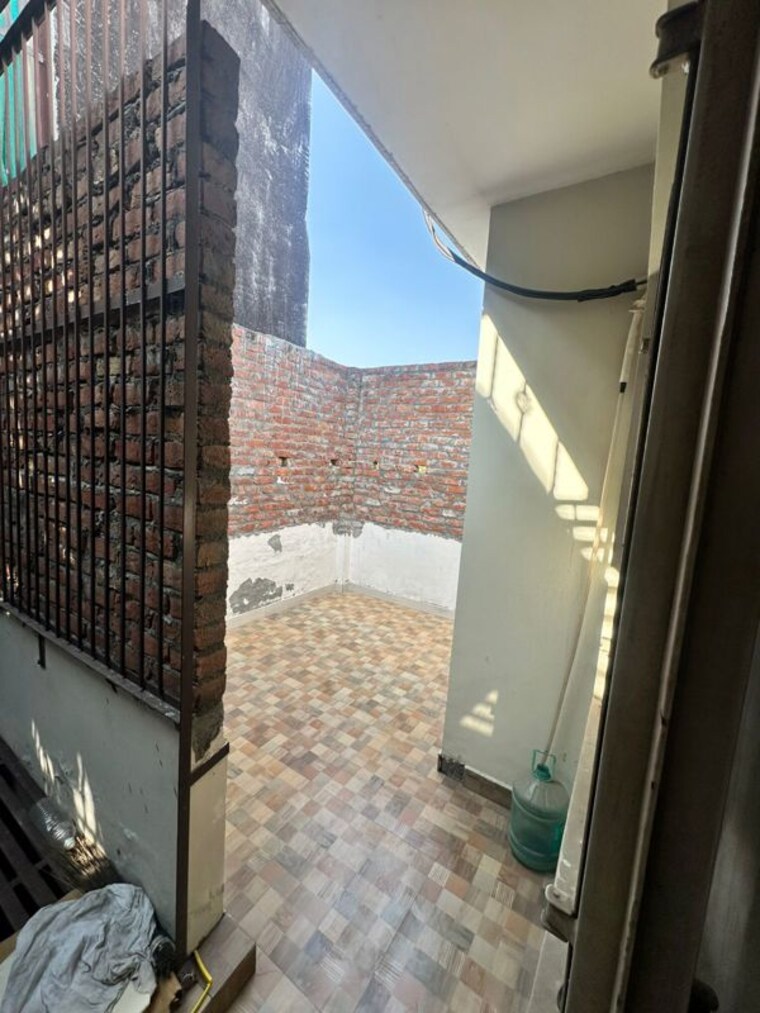Balcony, rwa-apartments-sector-12 2.5 Bedroom 750 Sq.Ft. Builder Floor In Sector 12 Noida 10442812