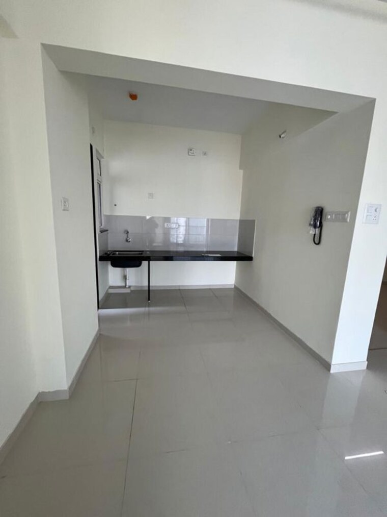 Kitchen, kolte-patil-life-republic-16th-avenue-arezo 2 Bedroom 750 Sq.Ft. Apartment In Hinjewadi Pune 10442859
