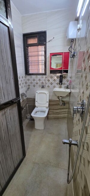 Bathroom in 1 BHK Apartment at Asthavinayak CHS Malad West, Malad West – for Rent