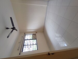 Bedroom in 1 BHK Apartment at Green Acres Apartment, Waghbil – for Rent