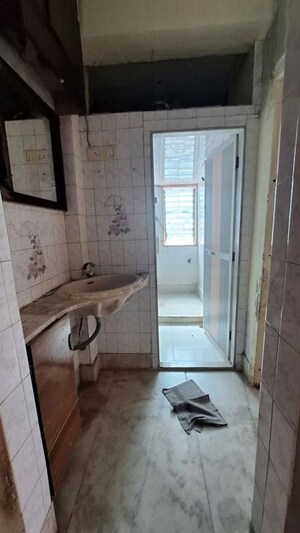 Bathroom in 2 BHK Apartment at Amita CHS Andheri West, Andheri West – for Rent