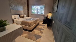 Living Room in 1 BHK Apartment at Sattva Songbird, Budigere Cross – for Sale