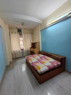 Bedroom in 2 BHK Apartment at Crystal Palace CHS, Malad West – for Rent