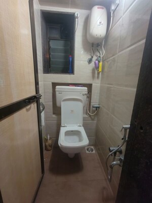 Bathroom in 2 BHK Apartment at Crystal Palace CHS, Malad West – for Rent