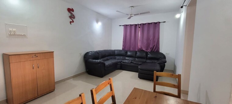 Living Room, magarpatta-daffodils-apartment 2 Bedroom 900 Sq.Ft. Apartment In Hadapsar Pune 10443341