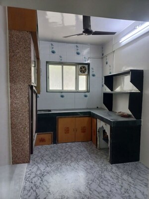 Kitchen in 1 BHK Apartment at Raut Baug Housing Complex, Dhankawadi – for Rent