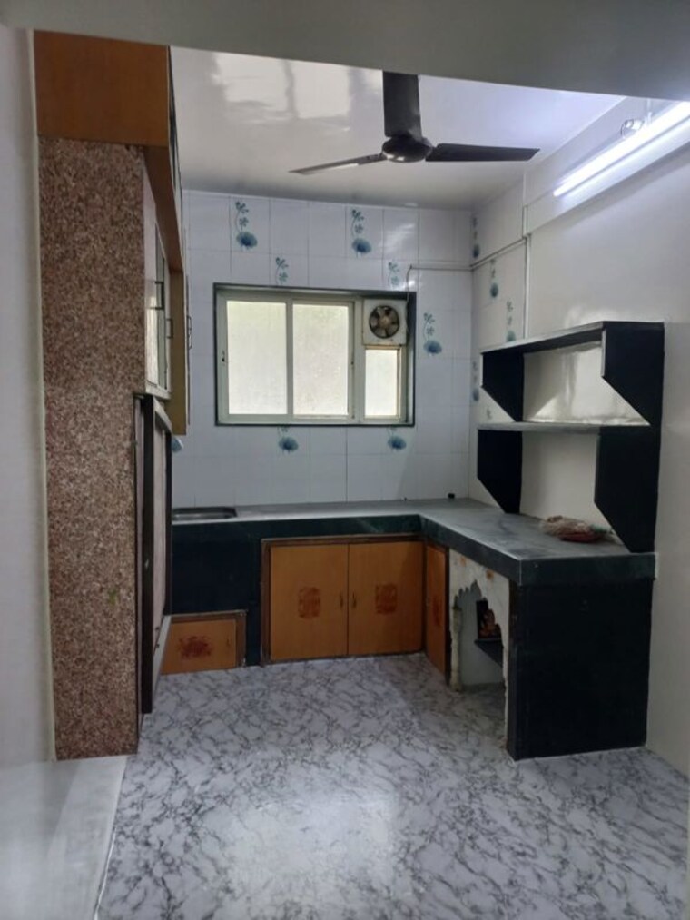 Kitchen, raut-baug-housing-complex 1 Bedroom 500 Sq.Ft. Apartment In Dhankawadi Pune 10443414