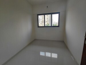 Room in 2.5 BHK Apartment at Lotus Sky Garden, Malad West – for Rent