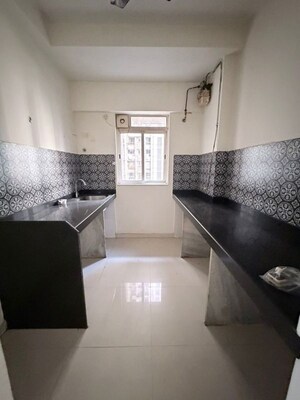 Kitchen in 1.5 BHK Apartment at Lodha Amara, Kolshet Road – for Sale