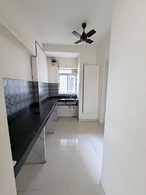 Kitchen in 1.5 BHK Apartment at Lodha Amara, Kolshet Road – for Sale