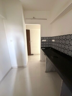 Kitchen in 1.5 BHK Apartment at Lodha Amara, Kolshet Road – for Sale
