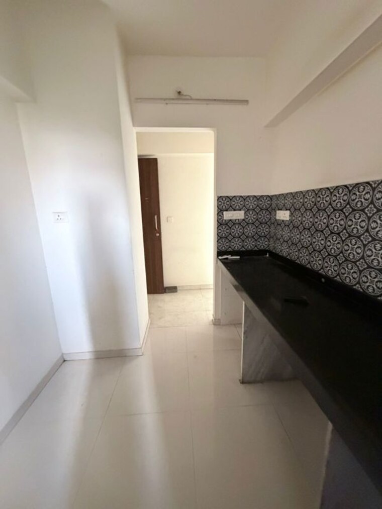 Kitchen, lodha-amara 1.5 Bedroom 551 Sq.Ft. Apartment In Kolshet Road Thane 10443535
