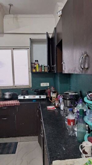 Kitchen in 2.5 BHK Apartment at Aims Golf City, Sector 75 – for Rent
