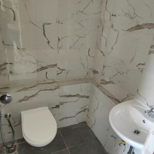 Bathroom in 2 BHK Apartment at Sheth Auris Bliss, Malad West – for Rent