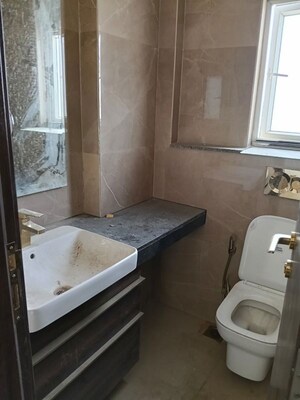 Bathroom in 2 BHK Apartment at Smart World Orchard, Sector 61 – for Rent