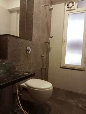 Bathroom in 3 BHK Apartment at Omkar Alta Monte, Malad East – for Rent