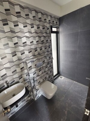 Bathroom in 2 BHK Apartment at Dhamji Shamji Mahavir Spring Tulip Phase 1, Pokhran Road No Two – for Sale