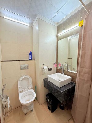 Bathroom in Studio Apartment at Gaur City Center, Sector 4 Greater Noida – for Rent
