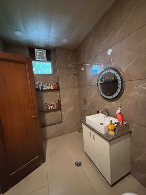 Bathroom in 3 BHK Builder Floor at Nehru Enclave – for Rent