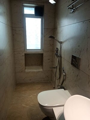 Bathroom in 3 BHK Apartment at Group Seven Rushi Heights, Goregaon East – for Rent