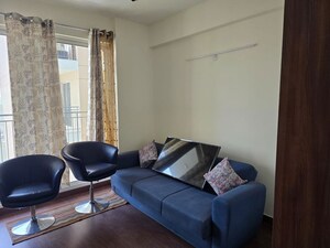 Living Room in 3 BHK Apartment at Emaar Palm Terraces Select, Sector 66 – for Sale