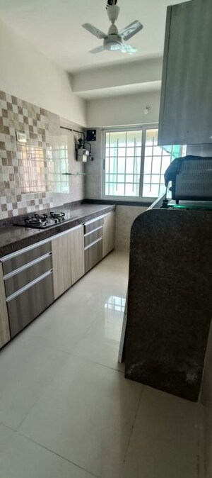 Kitchen in 3 BHK Apartment at Omkar Alta Monte, Malad East – for Rent