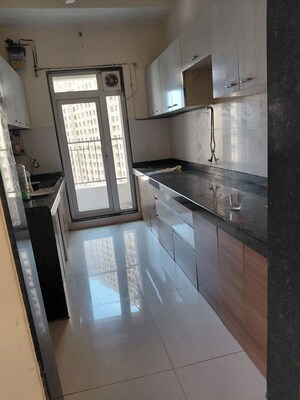 Kitchen in 3 BHK Apartment at Rustomjee Urbania Azziano, Thane West – for Rent