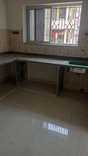 Kitchen in 3 BHK Apartment at Agate Akash, New Town – for Sale