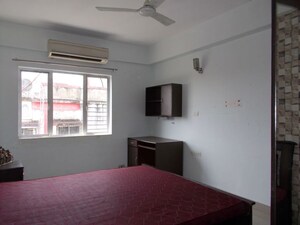 Bedroom in 4 BHK Apartment at South City Villa, B L Saha Road – for Sale