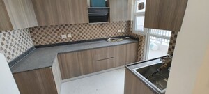 Kitchen in 3 BHK Apartment at Adani M2K Oyster Grande, Sector 102 – for Rent